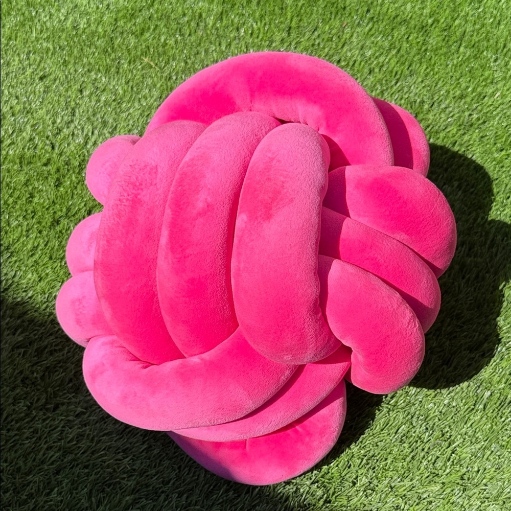 Plush Pink Knot Pillow